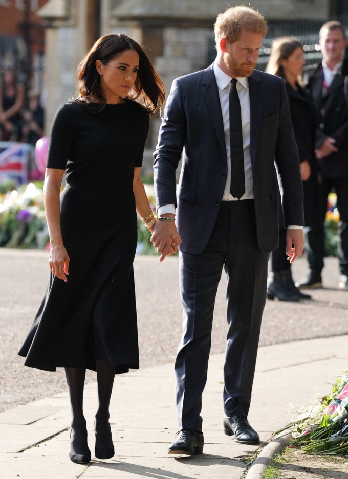 Prince Harry & Meghan Markle hold hands