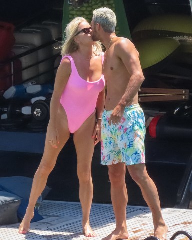 EXCLUSIVE: 46-year-old Caroline Stanbury flaunted a pink bikini with her husband Sergio Carrallo on the SuperYacht with their friends. 29 Jun 2022 Pictured: Sergio Carrallo, Caroline Stanbury. Photo credit: A LONE WOLF / MEGA TheMegaAgency.com +1 888 505 6342 (Mega Agency TagID: MEGA873306_027.jpg) [Photo via Mega Agency]