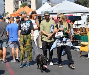 EXCLUSIVE: Heidi Klum and her husband Tom Kaulitz enjoy some beers as they stroll through a local flea market. Heidi was seen enjoying herself as she strolled with her husband. They were very affectionate with each other, constantly holding hands and kissing throughout their shopping excursion. They were joined by Heidi's daughter Leni and Tom's brother Bill and his dog. Heidi and her family were seen purchasing many clothes. Her daughter Leni was even seen crouched down digging through piles of denim. Heidi scored a leather jacket and a vase, and they were also seen leaving with large chairs. 13 Oct 2019 Pictured: Heidi Klum, Tom Kaulitz, Leni Samuel, Bill Kaulitz. Photo credit: Snorlax / MEGA TheMegaAgency.com +1 888 505 6342 (Mega Agency TagID: MEGA526675_025.jpg) [Photo via Mega Agency]