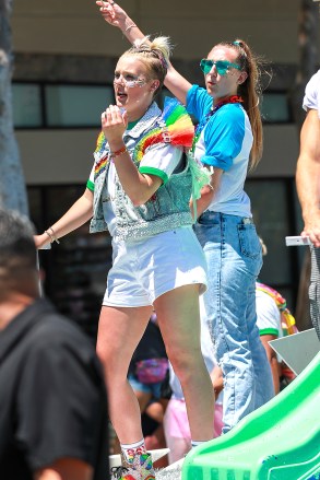 WEST HOLLYWOOD, CA - JoJo Siwa and girlfriend Kylie Prew rock the West Hollywood Pride Parade.  Pictured: JoJo SiwaBACKGRID USA June 5, 2022 BYLINE MUST READ: affinitypicture / BACKGRIDUSA: +1 310798 9111 / usasales@backgrid.com UK: +44 208 344 2007 / uksales@backgrid.com* UK customers - images contain Kids, please cut face before posting *