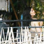 EXCLUSIVE: Kylie Jenner and Travis Scott have dinner together in a "bird's nest" booth at Komodo in Miami. At some point, a trophy seems to have been presented to the rapper, perhaps as a gag birthday gift from Kylie. 02 May 2021 Pictured: Kylie Jenner; Travis Scott. Photo credit: MEGA TheMegaAgency.com +1 888 505 6342 (Mega Agency TagID: MEGA751445_011.jpg) [Photo via Mega Agency]
