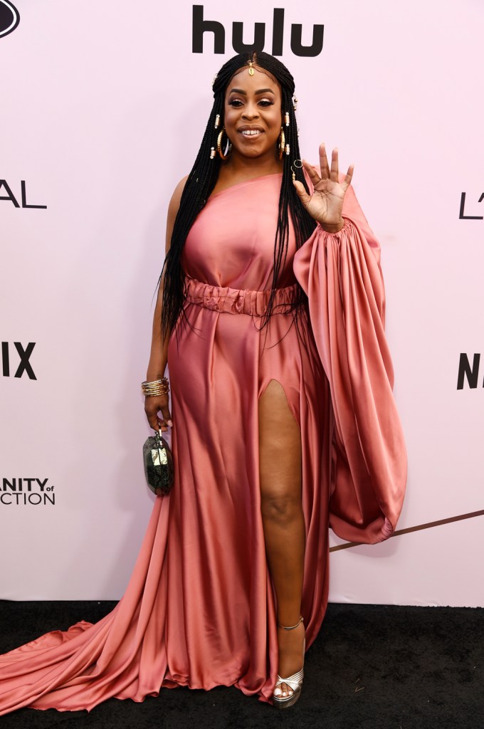 Niecy Nash looked beautiful in a pink silk gown with long train.