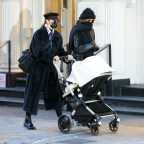 Sisters Gigi And Bella Hadid Walk Through Soho With Gigi‚Äôs Newborn Daughter In A Stroller In New York City