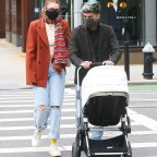 Gigi Hadid and Zayn Malik show off their impressive couple style on a walk with daughter Khai