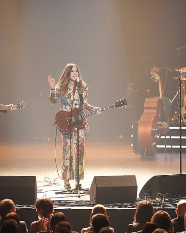 Alana Haim, from left, Danielle Haim, Este Haim of Haim perform onstage at the 2018 MusiCares Person of the Year tribute honoring Fleetwood Mac at the Radio City Music Hall on Friday, Jan. 26, 2018 in New York. (Photo by Evan Agostini/Invision/AP)'