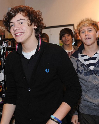 X-Factor 2010.X Factor's One Direction members Harry Styles (left) and Niall Horan arrive for an autograph signing session at the HMV store, Bradford. Picture date: Monday December 6, 2010. Photo credit should read: Anna Gowthorpe/PA Wire URN:9880410 (Press Association via AP Images)
