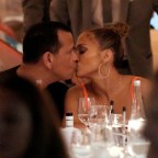 EXCLUSIVE: Jennifer Lopez and fiance Alex Rodriguez share a passionate kiss wile enjoying a dinner date in Saint Tropez