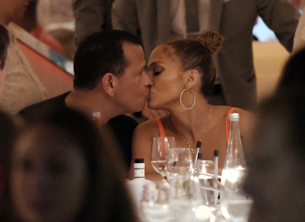 EXCLUSIVE: Jennifer Lopez and fiance Alex Rodriguez share a passionate kiss wile enjoying a dinner date in Saint Tropez