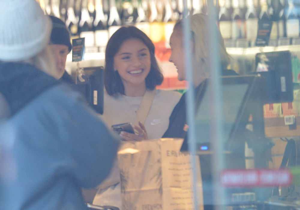 EXCLUSIVE: JoJo Siwa and TikTok model Savannah Demers flirt with each other while shopping for food together at Erewhon in Los Angeles Wednesday. This is the first time the Youtube superstar, 19, has been photographed since breaking up with her ex-girlfriend Avery Cyrus last month. She went casual in a hoodie and sweatpants with Converse high tops for the outing, while her new love showed off her long legs in shorts and sneakers. The duo were all smiles, giggling at the cash register before walking to the car looking happy and relaxed. 18 Jan 2023 Pictured: JoJo Siwa flirts with her new TikTok model girlfriend Savannah Demers while on lunch a date. Photo credit: GP / MEGA TheMegaAgency.com +1 888 505 6342 (Mega Agency TagID: MEGA934102_032.jpg) [Photo via Mega Agency]