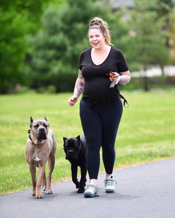 EXCLUSIVE: Teen Mom Star, Kailyn Lowry, was spotted showing off her growing baby bump while walking her dogs in Delaware. She recently split from her baby's father, and is planning to continue raising her kids on her own. She walked her massive Cane Corso puppies with no leash , wearing casual black workout gear. 27 May 2020 Pictured: Kailyn Lowry. Photo credit: MEGA TheMegaAgency.com +1 888 505 6342 (Mega Agency TagID: MEGA673363_002.jpg) [Photo via Mega Agency]