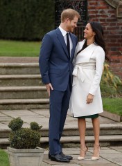 Britain's Prince Harry and his fiancee Meghan Markle pose for photographers during a photocall in the grounds of Kensington Palace in London, . Britain's royal palace says Prince Harry and actress Meghan Markle are engaged and will marry in the spring of 2018
Britain Royal Engagement, London, United Kingdom - 27 Nov 2017