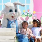 North West and Penelope Disick wear bunny ears as they take a picture with the Easter Bunny at Underwood Family Farms