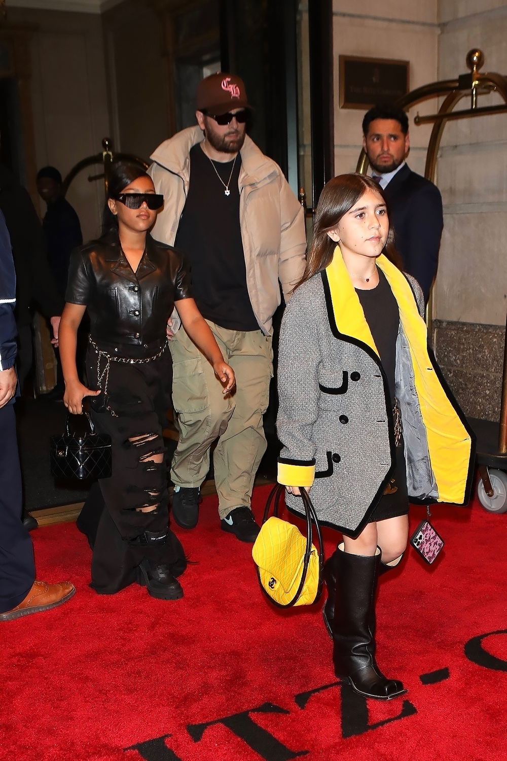 North West, Penelope & Scott Disick step out in the rain in NYC