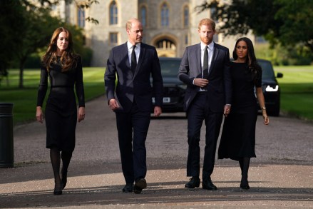 The Princess of Wales Kate Middleton, the Prince of Wales Prince William and the Duke and Duchess of Sussex Prince Harry and Meghan Markle meeting members of the public at Windsor Castle in Berkshire following the death of Queen Elizabeth II on Thursday.  10 Sep 2022 Pictured: The Duke and Duchess of Sussex and the Prince and Princess of Wales.  Meghan Markle, Prince Harry, Prince William and Kate Middleton.  Photo credit: Kirsty O'Connor/WPA-Pool/MEGA TheMegaAgency.com +1 888 505 6342 (Mega Agency TagID: MEGA894302_007.jpg) [Photo via Mega Agency]