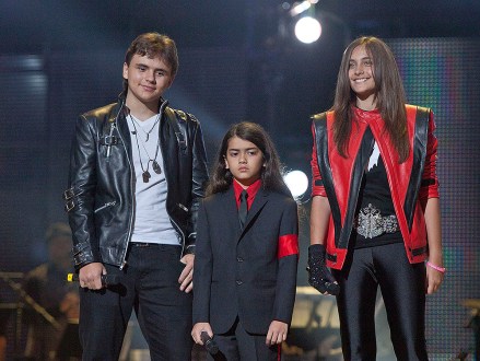 Prince Jackson, Prince Michael II "Blanket" Jackson, Paris Jackson From left, Prince Jackson, Prince Michael II "Blanket" Jackson and Paris Jackson arrive on stage at the Michael Forever the Tribute Concert, at the Millennium Stadium in Cardiff, Wales. Records filed by Jackson's estate executors in a Los Angeles probate court show that nearly $20 million was paid to support Katherine Jackson and her three grandchildren now in her care in the first three and a half years after her son Michael Jackson's death in June 2009. The payments by his estate to his mother and children have paid for everything from school tuition, tutors, vacations, the rental of a mansion and paying off the Jacksons' longtime family home located in Encino
Michael Jackson-Legal Woes