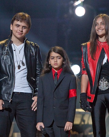 Prince Jackson, Prince Michael II "Blanket" Jackson, Paris Jackson From left, Prince Jackson, Prince Michael II "Blanket" Jackson and Paris Jackson arrive on stage at the Michael Forever the Tribute Concert, at the Millennium Stadium in Cardiff, Wales. Records filed by Jackson's estate executors in a Los Angeles probate court show that nearly $20 million was paid to support Katherine Jackson and her three grandchildren now in her care in the first three and a half years after her son Michael Jackson's death in June 2009. The payments by his estate to his mother and children have paid for everything from school tuition, tutors, vacations, the rental of a mansion and paying off the Jacksons' longtime family home located in Encino Michael Jackson-Legal Woes