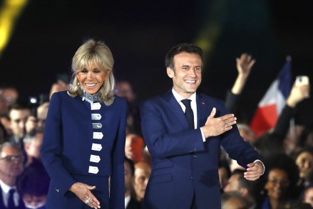 French President Emmanuel Macron and his wife Brigitte Macron celebrate on the stage after winning the second round of the French presidential elections at the Champs-de-Mars in Paris, France, 24 April 2022. Emmanuel Macron defeated Marine Le Pen in the final round of France's presidential election, with exit polls indicating that Macron is leading with approximately 58 percent of the vote.
Second round of the 2022 French presidential election, Paris, France - 24 Apr 2022