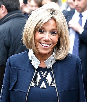 Brigitte, the wife of French independent centrist presidential candidate, Emmanuel Macron smiles after casting her vote in Le Touquet, France, . Voters across France are choosing a new president in an unusually tense and important election that could decide Europe's future, making a stark choice between pro-business progressive Emmanuel Macron and far-right populist Marine Le PenElection, Le Touquet, France - 07 May 2017