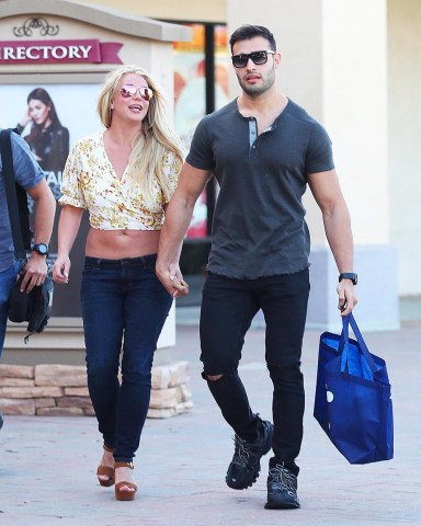 Britney Spears and her boyfriend Sam go shopping at an outlet mall.  Pictured: Britney Spears,Sam Asghari Ref: SPL5091025 170519 NON-EXCLUSIVE Picture by: SplashNews.com  Splash News and Pictures USA: +1 310-525-5808 London: +44 (0)20 8126 1009 Berlin: +49 175 3764 166 photodesk@splashnews.com  World Rights