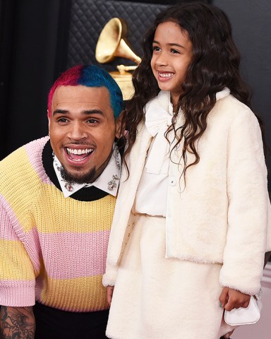 Chris Brown, left, and Royalty Brown arrive at the 62nd annual Grammy Awards at the Staples Center on Sunday, Jan. 26, 2020, in Los Angeles. (Photo by Jordan Strauss/Invision/AP)