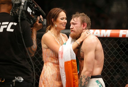 Conor McGregor celebrates with girlfriend Dee Devlin after defeating Chad Mendes during their interim featherweight title mixed martial arts bout at UFC 189, in Las Vegas UFC 189 Mixed Martial Arts, Las Vegas, USA