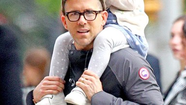 Ryan Reynolds giving 2-year-old daughter James a piggy-back ride in NYC