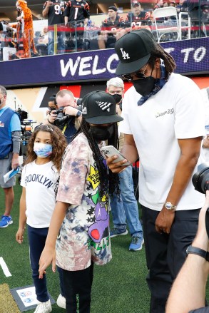 Rapper and producer Jay-Z (R) chats with his daughter Blue Ivy Carter while on the field before the start of Super Bowl LVI  between the Cincinnati Bengals and the Los Angeles Rams at SoFi Stadium in Los Angeles on Sunday, February 13, 2022.
Super Bowl Lvi, Los Angeles, California, United States - 13 Feb 2022