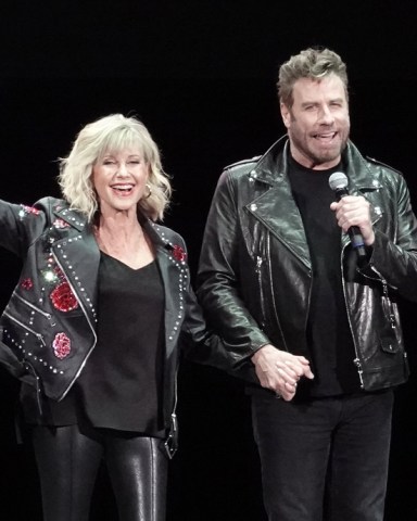 John Travolta and Olivia Newton John recreate their iconic Grease characters for the first time since the 1978 hit musical was made. The pair wowed fans in full costume at a ‘Meet ‘N Grease’ sing-a-long event in West Palm Beach, Florida. The film starred Travolta, now 65, as greaser Danny Zuko and Newton-John, now. 71, as Sandy. It became the highest-grossing musical film ever at the time. Its soundtrack album ended 1978 as the second-best selling album of the year in the United States, behind the soundtrack of the 1977 blockbuster Saturday Night Fever, which also starred Travolta. 13 Dec 2019 Pictured: John Travolta; Olivia Newton John. Photo credit: MEGA TheMegaAgency.com +1 888 505 6342 (Mega Agency TagID: MEGA568299_001.jpg) [Photo via Mega Agency]