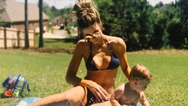 Katherine Webb in bikini while playing with son Tripp