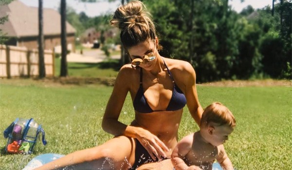 Katherine Webb in bikini while playing with son Tripp