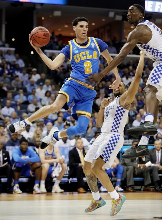 UCLA guard Lonzo Ball (2) drives against Kentucky in the second half of an NCAA college basketball tournament South Regional semifinal game, in Memphis, Tenn
NCAA UCLA Kentucky Basketball, Memphis, USA - 24 Mar 2017