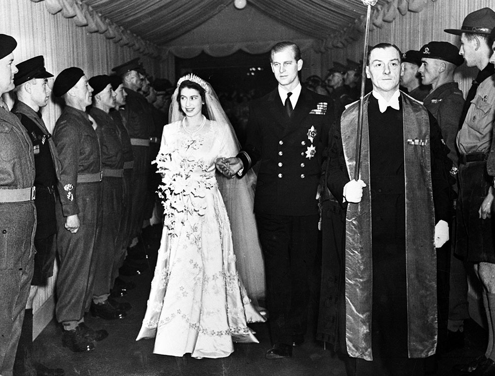 Britain's Princess Elizabeth and her husband the Duke of Edinburgh are seen leaving Westminster Abbey, London, on Nov. 20, 1947, following their wedding service. (AP Photo)