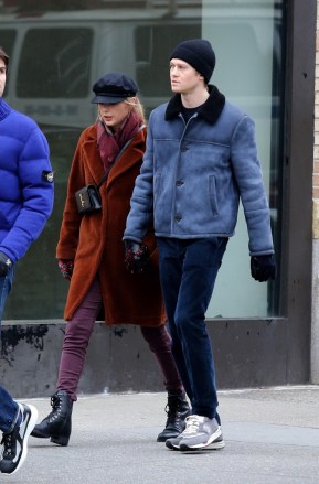 New York, NY  - Taylor Swift is seen hand-in-hand with boyfriend Joe Alwyn on a very cold day as they go for a long walk after having lunch at a West Village restaurant.  The couple had an entourage of friends and four bodyguards in tow. The pair were keeping a very low profile trying not to be noticed as they walked from the West Village to Washington Square Park and parts of the Soho area.Pictured: Taylor Swift, Joe AlwynBACKGRID USA 30 DECEMBER 2018 BYLINE MUST READ: BrosNYC / BACKGRIDUSA: +1 310 798 9111 / usasales@backgrid.comUK: +44 208 344 2007 / uksales@backgrid.com*UK Clients - Pictures Containing ChildrenPlease Pixelate Face Prior To Publication*