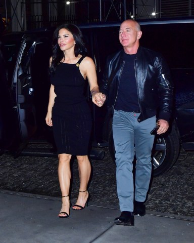 New York, NY  - *EXCLUSIVE*  - One of the world's richest men, Jeff Bezos, is walking hand-in-hand with his girlfriend Lauren Sanchez for dinner in NYC.  Pictured: Jeff Bezos, Lauren Sanchez  BACKGRID USA 5 MAY 2022   USA: +1 310 798 9111 / usasales@backgrid.com  UK: +44 208 344 2007 / uksales@backgrid.com  *UK Clients - Pictures Containing Children Please Pixelate Face Prior To Publication*