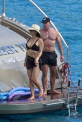 EXCLUSIVE: Amazon boss Jeff Bezos once again shows of his buff body as he cozies up to girlfriend Lauren Sanchez on a boat trip with their family during holiday season in St-Barts. The divorcee, who split from ex-wife MacKenzie Scott in 2019, looked tanned, buff and a far cry from the geeky tech nerd he once was as he cosied up to current squeeze Lauren Sanchez on the Caribbean island. Estimated to be worth £156.8billion ($210billion), Bezos is the second richest man in the world after Elon Musk - and he's undergone a spectacular image transformation since finding his fortune in online shopping. Perhaps the biggest change to Bezos' image in recent years is that he appears to have hit the gym in earnest, substantially beefing up his frame. While the young Bezos was a little rounder of face, by the time he had amassed his fortune he had slimmed down and sported a lean look. However, since meeting new squeeze Lauren Sanchez - but as early as 2017 when he was still with his wife Mackenzie, Bezos has beefed up considerably, sporting the kind of physique usually reserved for action heroes. The 57-year-old puts his newfound beef down to lots of sleep - eight hours a night, a healthy diet and plenty of working out. Even so, Bezos has largely kept his body under wraps until now...but the hot weather in St Barts has clearly left him keen to let loose and showcase the hard work he has put in on making himself more toned. The star oozed confidence on his holiday with lover Sanchez in one of the first sightings of him strutting around in just a pair of shorts. 26 Dec 2021 Pictured: Jeff Bezos and Lauren Sanchez. Photo credit: IMP/Backgrid/EliotPress/MEGA TheMegaAgency.com +1 888 505 6342 (Mega Agency TagID: MEGA816317_001.jpg) [Photo via Mega Agency]