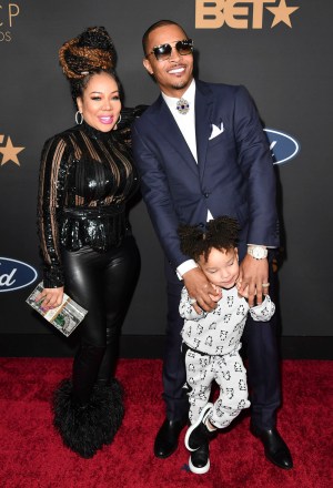 Tameka Harris, left, T.I., and their daughter Heiress Diana Harris arrive at the NAACP 51st Image Awards at the Pasadena Civic Auditorium on Saturday, February 22, 2020 in Pasadena, CA. (Earl Gibson III via AP)