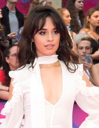 Camila Cabello arrives on the red carpet at the 2017 Much Music Video Awards in Toronto on Sunday, June 18, 2017. (Nathan Denette/The Canadian Press via AP)