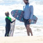 Christian Bale Bodyboarding Son Joseph BACKGRID