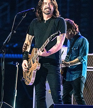 The Foo Fighters perform at the Vax Live concert at SoFi Stadium on Sunday, May 2, 2021 in Inglewood, CA. (Jason Armond / Los Angeles Times)Vax Live concert at SoFi Stadium on Sun 5/2 with Foo Fighters, Brian Johnson, Jennifer Lopez, H.E.R., J. Balvin, David Letterman, Selena Gomez, Kevin Frazier, Sofi Stadium, Inglewood, California, United States - 02 May 2021