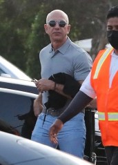 Malibu, CA  - *EXCLUSIVE*  - Jeff Bezos is spotted heading to dinner at Nobu on Wednesday ahead of his first space flight. The Amazon founder's aerospace company, Blue Origin, announced today that 18-year-old Oliver Daemen will fly aboard the New Shepard vessel during its first human space flight scheduled for July 20. Bezos was surrounded by a lot of security as he made his way into the Malibu hotspot with girlfriend Lauren in a fitted white dress with a slit up the thigh by his side. *Shot on July 14, 2021*Pictured: Jeff BezosBACKGRID USA 15 JULY 2021USA: +1 310 798 9111 / usasales@backgrid.comUK: +44 208 344 2007 / uksales@backgrid.com*UK Clients - Pictures Containing Children
Please Pixelate Face Prior To Publication*