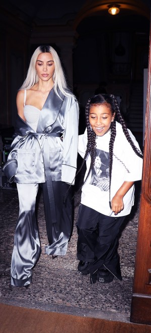 Milan, ITALY - *EXCLUSIVE* - Kim Kardashian and daughter North West take off from the set of a photoshoot in Milan. Kim rocks an off-the-shoulder look as she dons a satin robe for the occasion.Pictured: Kim Kardashian, North West BACKGRID USA 27 SEPTEMBER 2022 BYLINE MUST READ: @Lucasgro / BACKGRIDUSA: +1 310 798 9111 / usasales@backgrid.comUK: +44 208 344 2007 / uksales@backgrid.com*UK Clients - Pictures Containing ChildrenPlease Pixelate Face Prior To Publication*