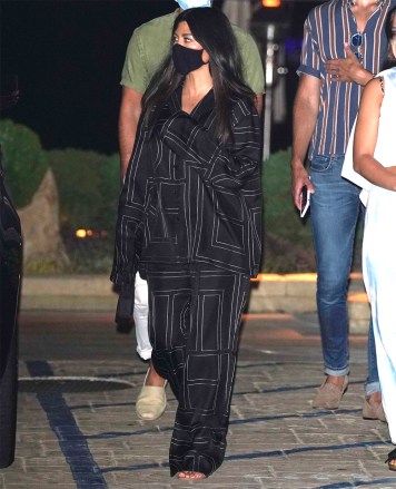 Malibu, CA  - Kourtney Kardashian looks hot in a Pajama style outfit while out to dinner with friend Addison RaePictured: Kourtney KardashianBACKGRID USA 15 JULY 2020 USA: +1 310 798 9111 / usasales@backgrid.comUK: +44 208 344 2007 / uksales@backgrid.com*UK Clients - Pictures Containing ChildrenPlease Pixelate Face Prior To Publication*