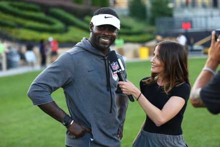Michael Vick is interviewed on field during the American Flag Football League (AFFL) U.S. Open of Football tournament, in Kennesaw, Ga
AFFL U.S. Open Of Football - Semifinals, Kennesaw, USA - 08 Jul 2018