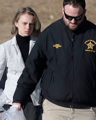 Michelle Carter, left, leaves the Bristol County jail, in Dartmouth, Mass., after serving most of a 15-month manslaughter sentence for urging her suicidal boyfriend to kill himself in 2014. The 23-year-old, released three months early for good behavior, will serve five years of probation Texting Suicide, Dartmouth, USA - 23 Jan 2020