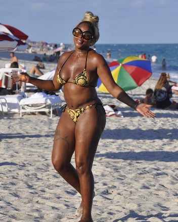 American singer, songwriter and actress Mary J. Blige was photographed looking amazing in a strappy bikini while drinking her own brand of wine, called 'Sun Goddess'.  The 50-year-old Grammy winner also posed with some bottles of Sun Goddess Sauvignon Blanc as she enjoyed a beautiful sunny day at the beach on the VIP loungers of her luxury beachfront hotel with a friend of hers.  Photo: Mary J. Blige Ref: SPL5280587 111221 NON-EXCLUSIVE Photo By: Fred Montana / SplashNews.com Splash News and Pictures USA: +1 310-525-5808 London: +44 (0)20 8126 1009 Berlin: + 49 175 3764 166 photodesk@splashnews.com Worldwide Rights