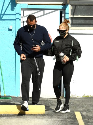Jennifer Lopez and finance Alex Rodriguez workout at SOMI gym the day after Christmas in Miami, Florida. 26 Dec 2020 Pictured: Jennifer Lopez, Alex Rodriguez. Photo credit: MEGA TheMegaAgency.com +1 888 505 6342 (Mega Agency TagID: MEGA723048_028.jpg) [Photo via Mega Agency]