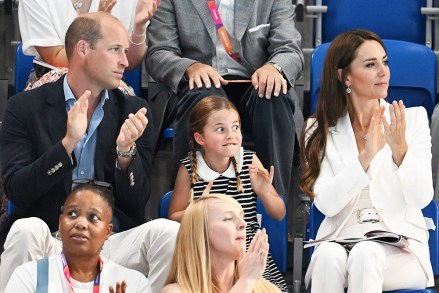 (LR) Britain's Prince William, Princess Charlotte and Kate, Duchess of Cambridge watch on from the stands during Day 5 of the XXII Commonwealth Games at the Sandwell Aquatics Center in Birmingham, Britain, 02 August 2022. 2022 Commonwealth Games - Day 5, Birmingham , United Kingdom - 02 Aug 2022