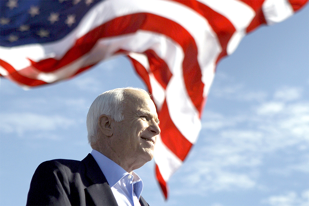 FILE - In this Nov. 3, 208 file photo, Republican presidential candidate Sen. John McCain, R-Ariz. speaks at a rally outside Raymond James Stadium in Tampa, Fla. President Donald Trump is not backing down from his longstanding criticism of the late Sen. John McCain. Trump declared Tuesday at the White House: “I was never a fan of John McCain and I never will be.” Trump drew criticism over the weekend for tweeting insults at McCain, a Vietnam war hero, Arizona senator and 2008 Republican presidential candidate who died last year of brain cancer. (AP Photo/Carolyn Kaster)