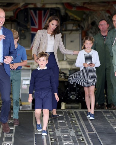 The Prince and Princess of Wales, Prince George, Princess Charlotte and Prince Louis visit the Air Tattoo at RAF Fairford, in Fairford, Gloucestershire, UK, on the 14th July 2023. 14 Jul 2023 Pictured: The Prince and Princess of Wales, Prince George, Princess Charlotte and Prince Louis visit the Air Tattoo at RAF Fairford, in Fairford, Gloucestershire, UK, on the 14th July 2023. Photo credit: James Whatling / MEGA TheMegaAgency.com +1 888 505 6342 (Mega Agency TagID: MEGA1007287_055.jpg) [Photo via Mega Agency]
