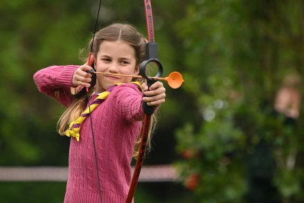 Britain's Princess Charlotte tries her hand at archery while taking part in the Big Help Out, during a visit to the 3rd Upton Scouts Hut in Slough, west of London on May 8, 2023, where the family joined volunteers helping to renovate and improve the building. - People across Britain were on Monday asked to do their duty as the celebrations for King Charles III's coronation drew to a close with a massive volunteering drive.
The Big Help Out, 3rd Upton Scouts Hut, Slough, UK - 08 May 2023